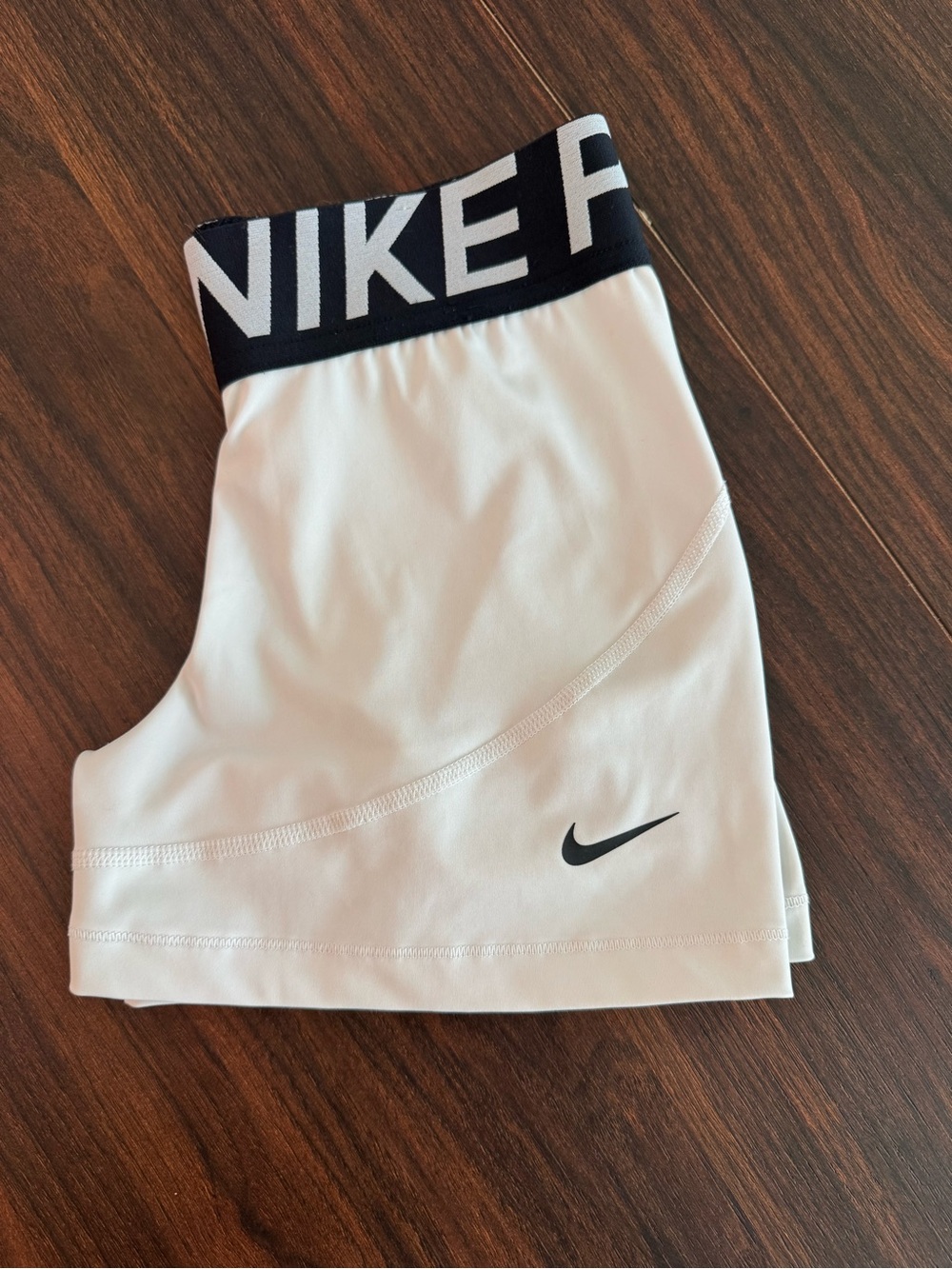 Nike Women’s White Athletic Shorts with Black Branded Waistband